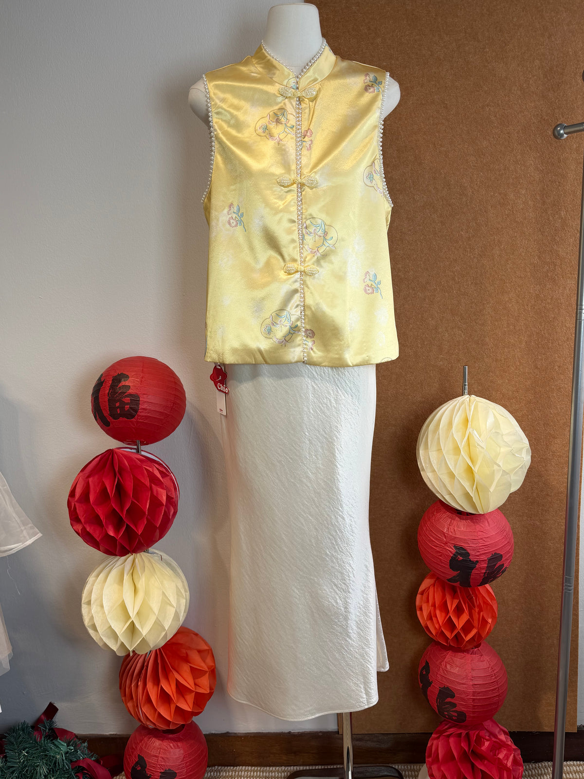 Sleeveless Qipao-Inspired Satin Top with Embroidered Florals, Frog Buttons and Pearl-Beaded Trim | Zia