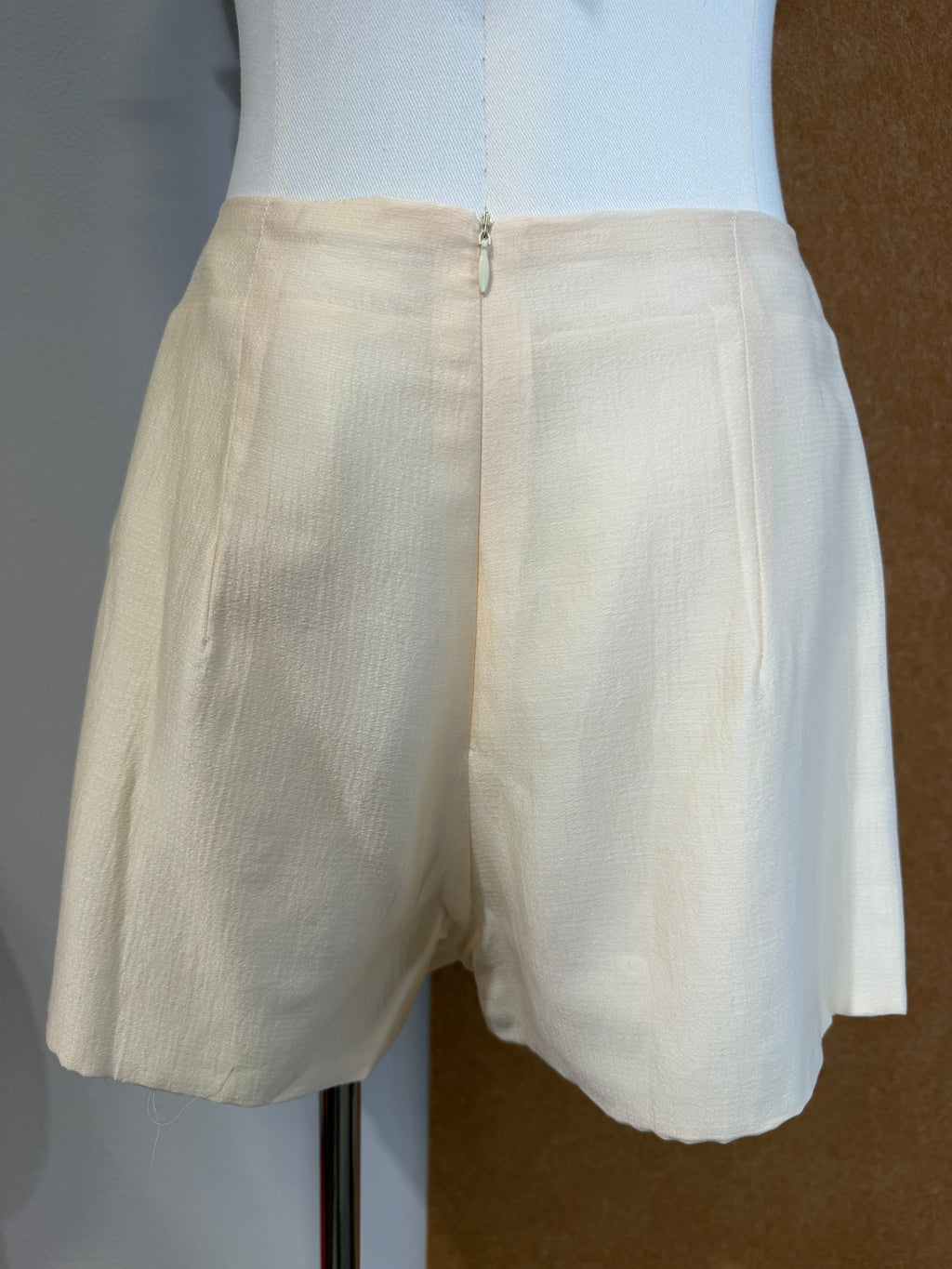 Textured Woven High-Waist Mini Skirt with Hidden Ruffle Hem | Kynah