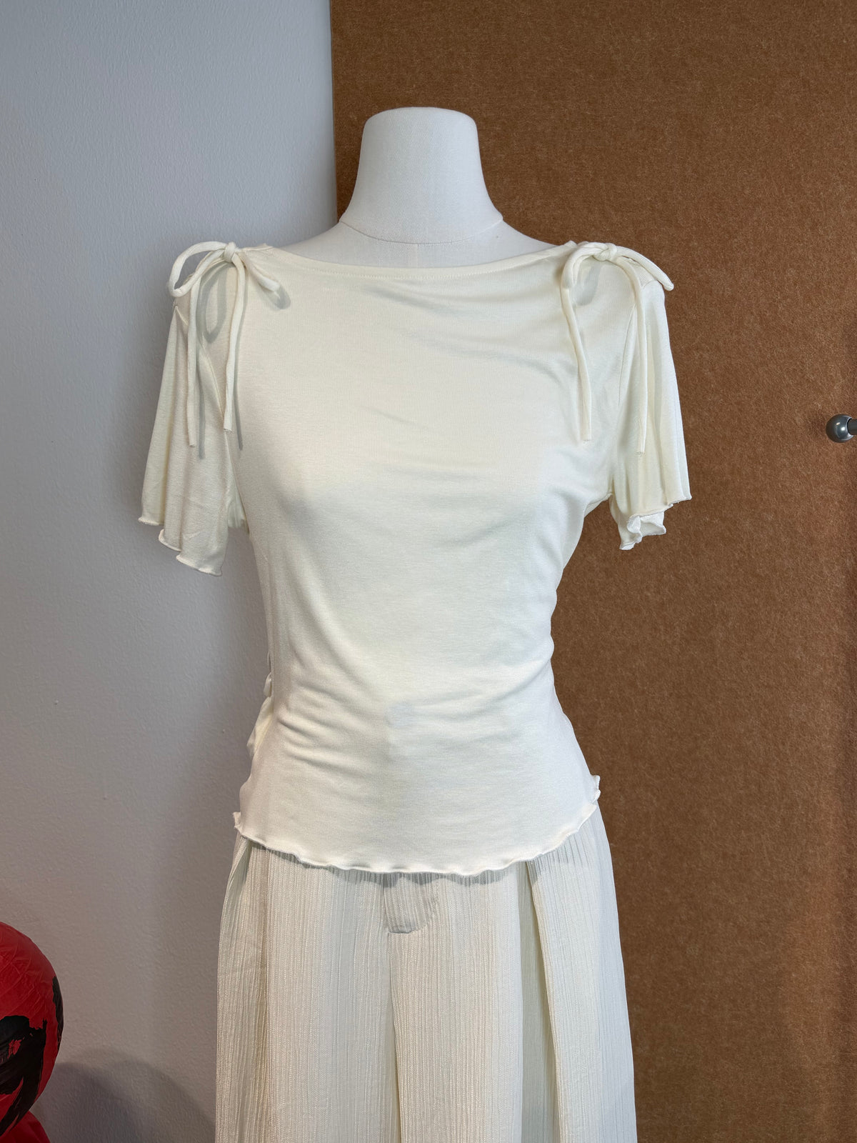Open-Shoulder Tie Bow Ruched Jersey Top | Ari