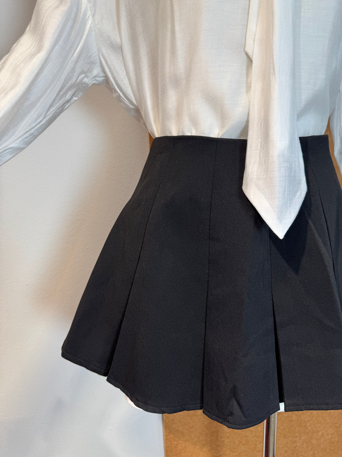 High-Waist Pleated Mini Skirt with Built-In Shorts | Corinne