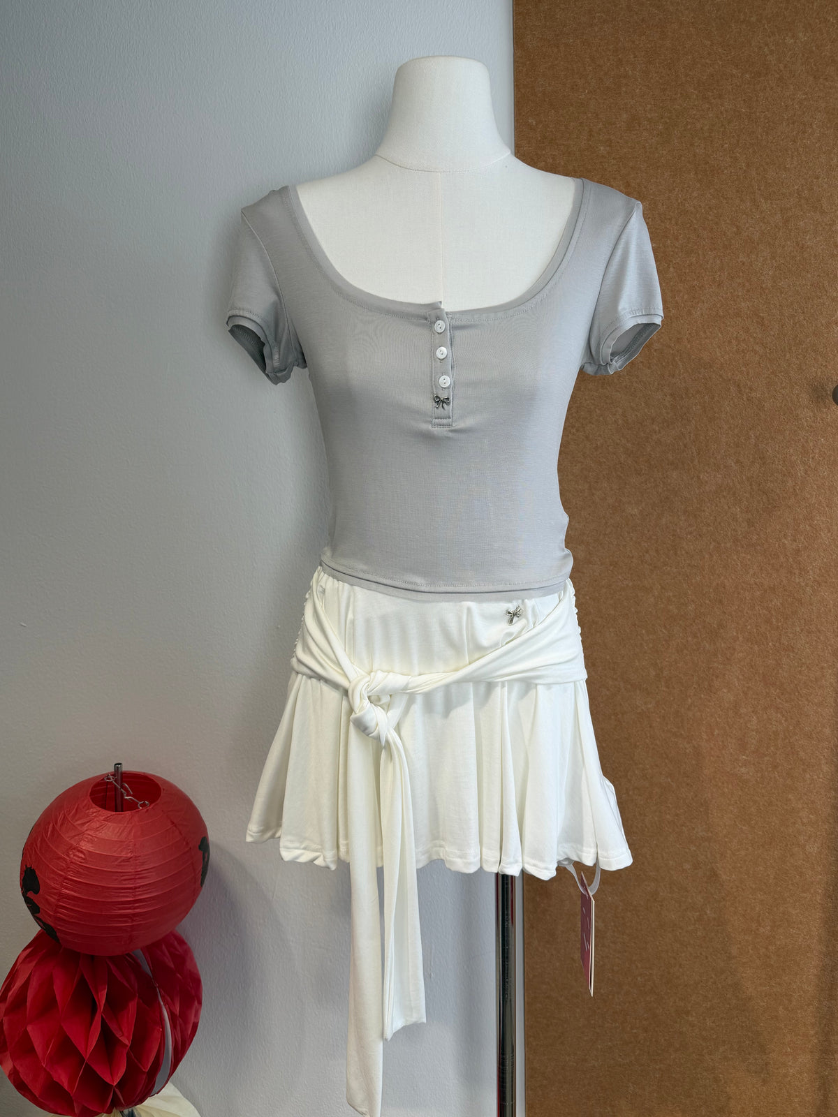Low-Rise Tie Waist Pleated Ruffle Mini Skirt | Galaxy