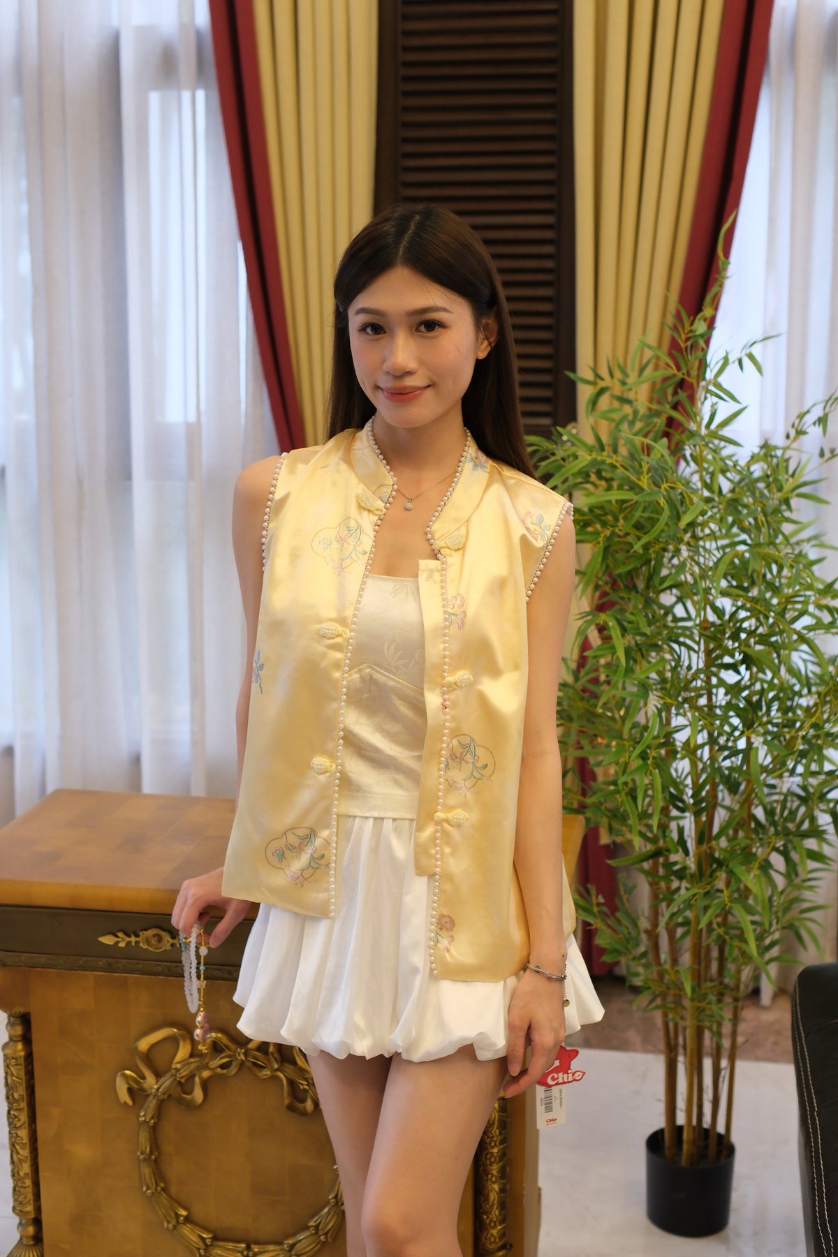 Sleeveless Qipao-Inspired Satin Top with Embroidered Florals, Frog Buttons and Pearl-Beaded Trim | Zia