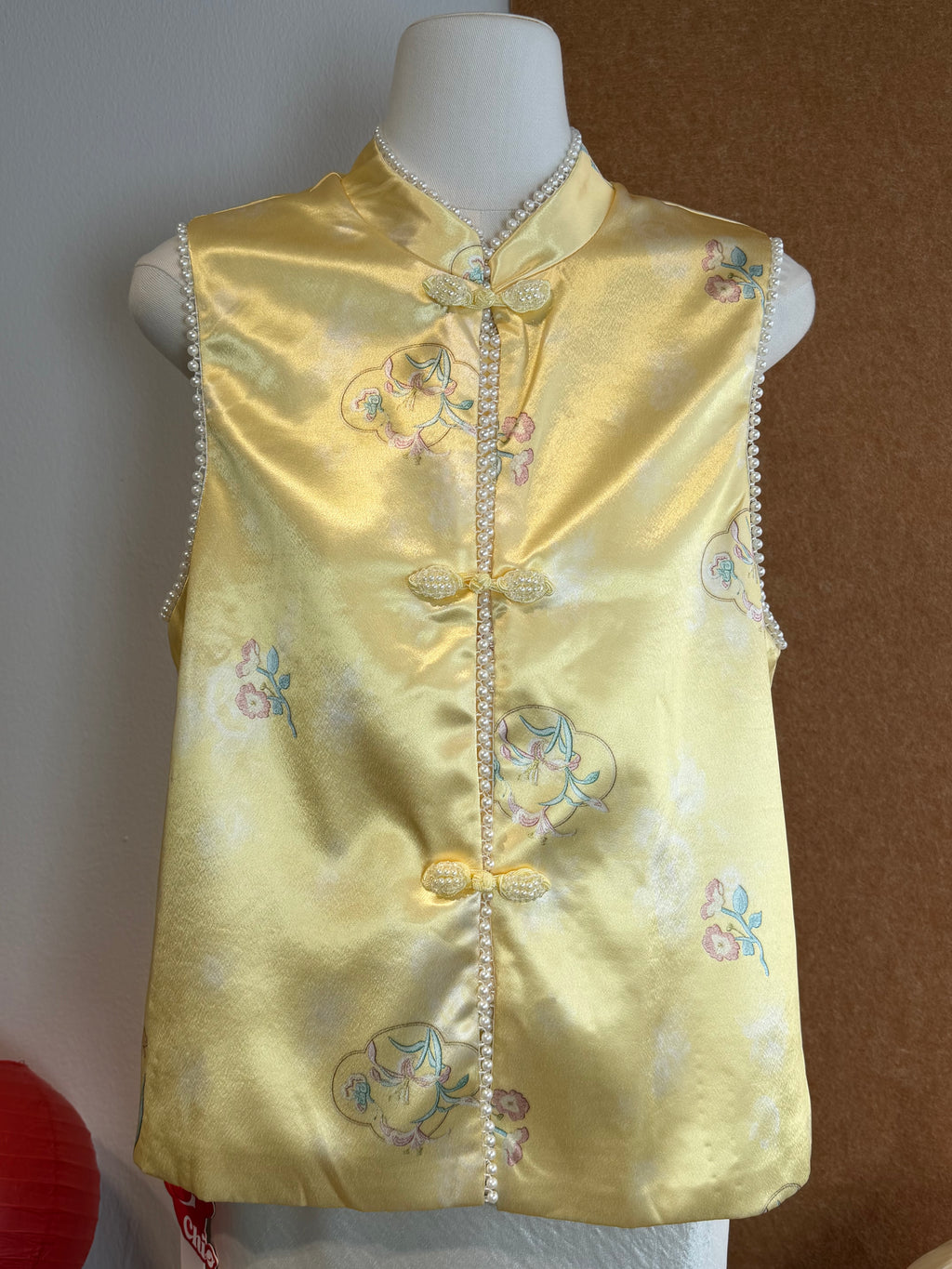 Sleeveless Qipao-Inspired Satin Top with Embroidered Florals, Frog Buttons and Pearl-Beaded Trim | Zia