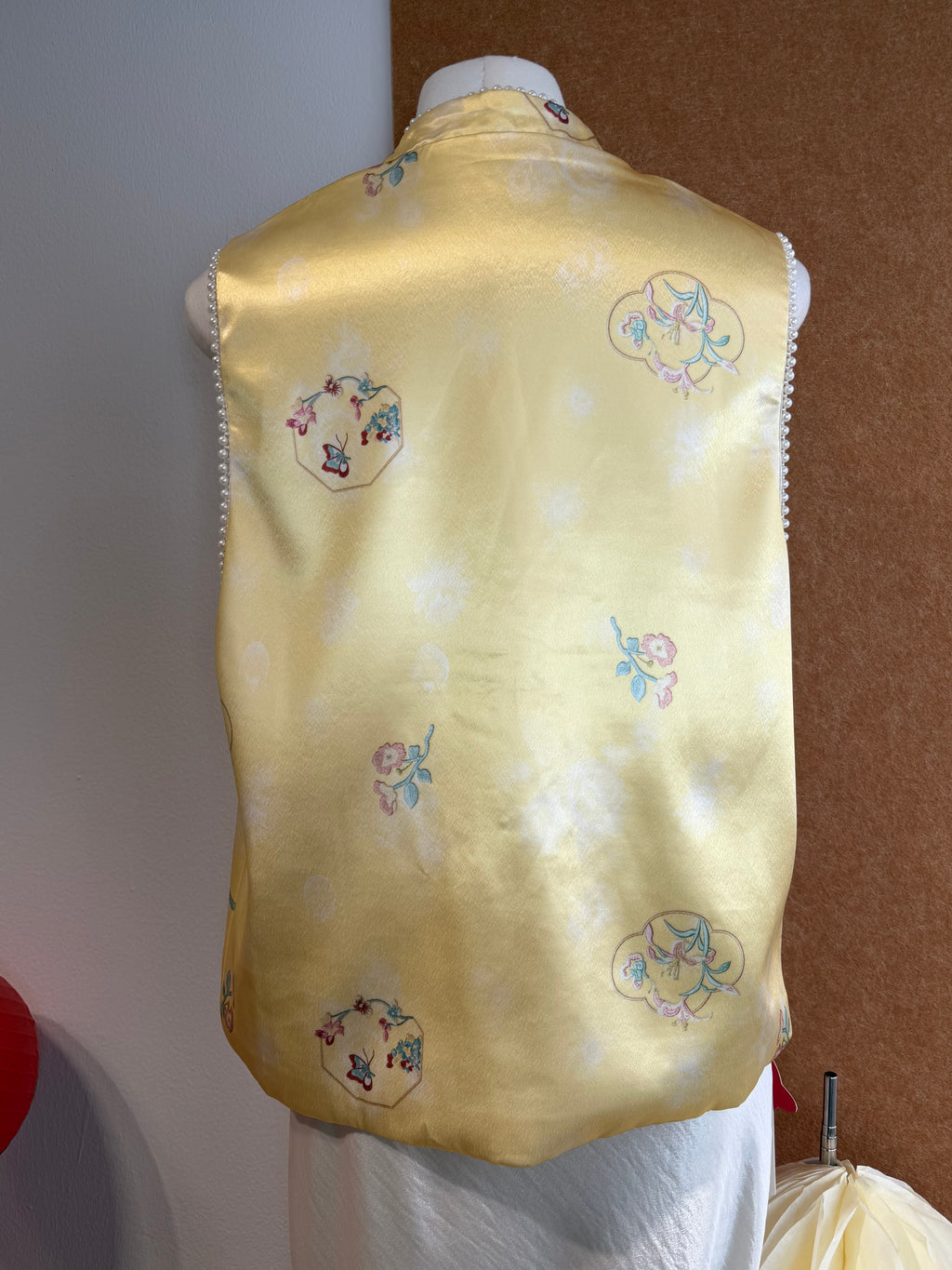 Sleeveless Qipao-Inspired Satin Top with Embroidered Florals, Frog Buttons and Pearl-Beaded Trim | Zia