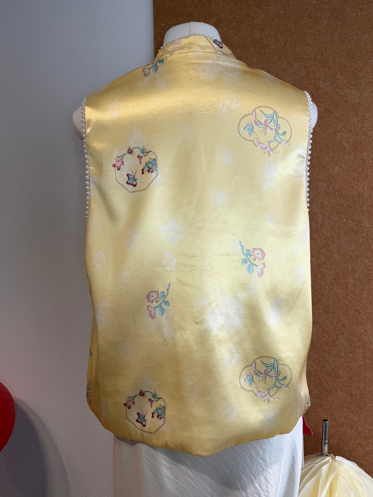 Sleeveless Qipao-Inspired Satin Top with Embroidered Florals, Frog Buttons and Pearl-Beaded Trim | Zia