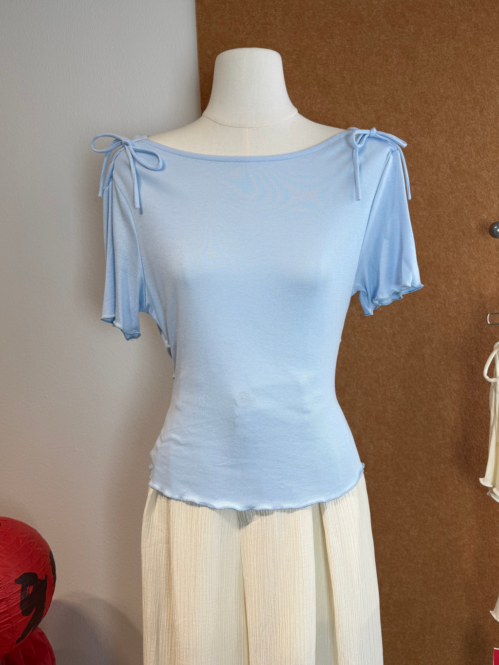 Open-Shoulder Tie Bow Ruched Jersey Top | Ari