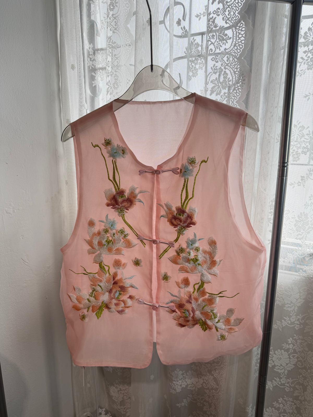 Sleeveless Sheer Organza Top with 3D Raised Floral Embroidery and Satin Loop Buttons | Zoya